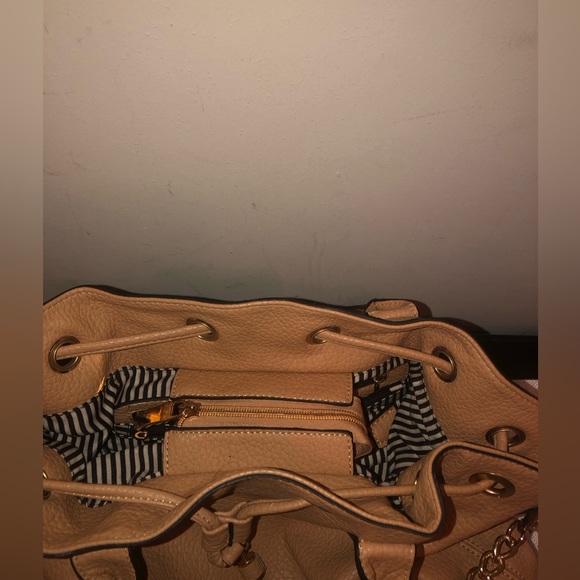 Handbag with black and white stripes inside; classy bag can dress up or down - Picture 3 of 8